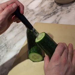 Fraser uses a marrow scoop to core cucumbers. The core is slivered and pickled, while the rest is diced and tossed into the bulgur salad.