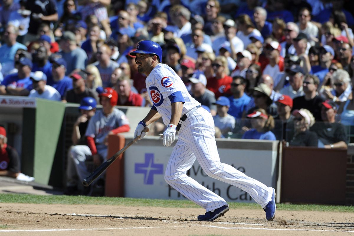 David DeJesus of the Chicago Cubs hits a single against the Cincinnati Reds at Wrigley Field in Chicago, Illinois. (Photo by David Banks/Getty Images) 
