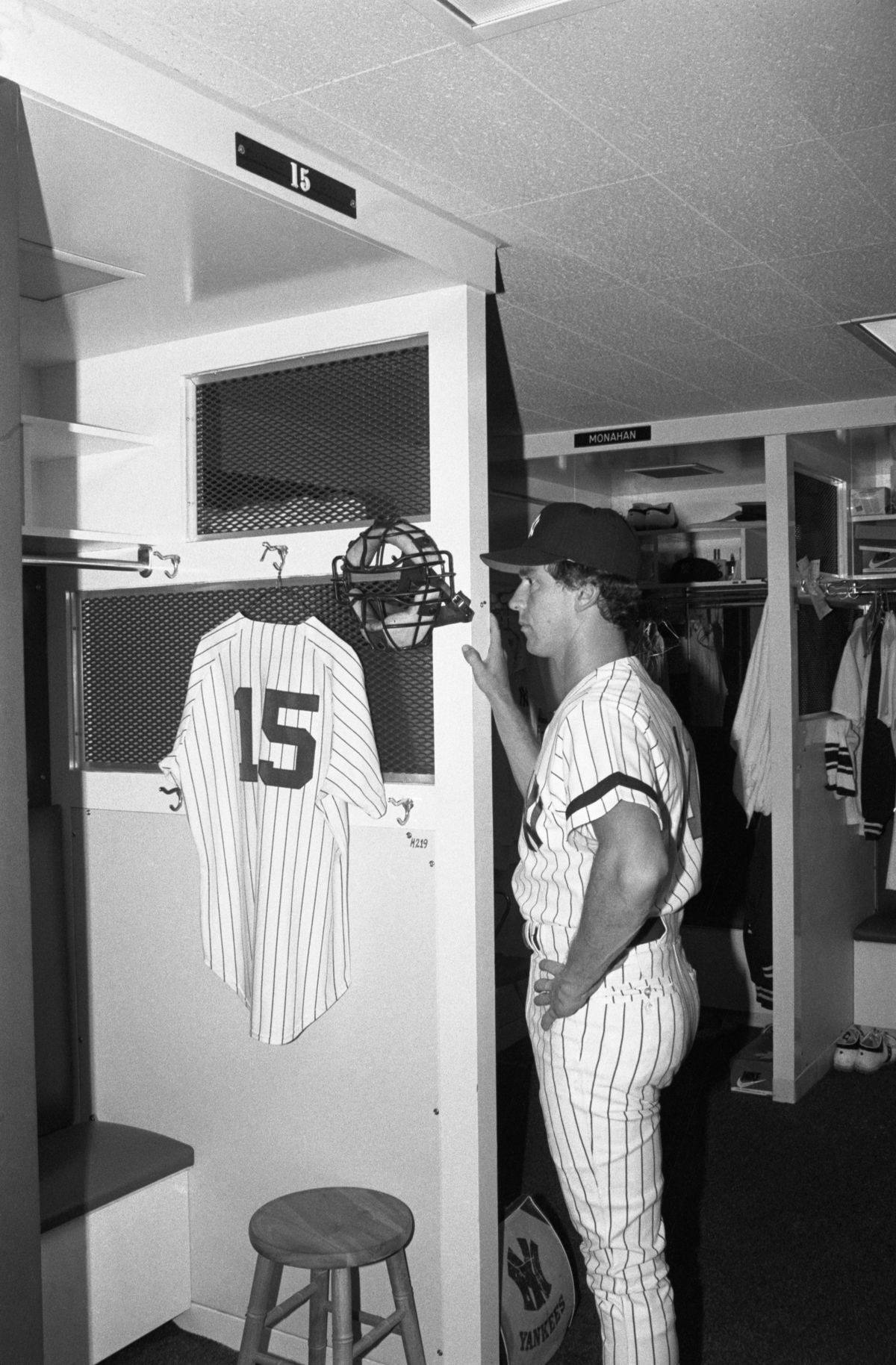 Fred Stanley Pauses in Front of Munson’s Locker
