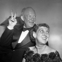 Gen. Dwight D. Eisenhower holds up his fingers in the V for victory sign as he and happy Mrs. Mamie Eisenhower sit in their hotel room in New York on Nov. 4, 1952, after Ike’s election as the next president of the United States. This happy scene took place just before Ike went down to the grand ballroom of the Commodore Hotel to face his happy followers.