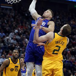LA Clippers forward Blake Griffin goes up for a dunk with Utah Jazz forward Joe Ingles defending during NBA basketball in Salt Lake City on Saturday, Jan. 20, 2018.