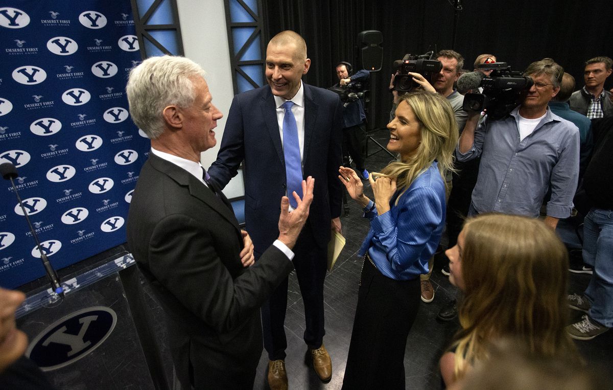 BYU President Kevin J Worthen talks with new men’s basketball head coach Mark Pope and his wife Lee Anne after a press conference at the BYU Broadcast building in Provo on Wednesday, April 10, 2019.