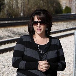 Jill Welch of Farmington talks Tuesday, Nov. 15, 2011 about her experience in an automobile on the tracks at 600 Old Mill Lane in Kaysville as a FrontRunner train approached. 