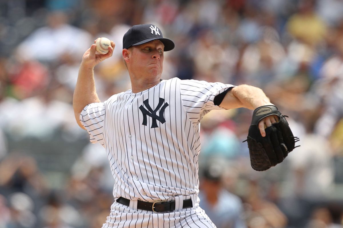 Brian Gordon of the New York Yankees pitches against the Texas Rangers during their game on June 16, 2011 at Yankee Stadium in the Bronx borough of New York City.  (Photo by Al Bello/Getty Images)