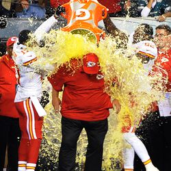 Kansas City Chiefs receiver Donnie Avery (17) and Dwayne Bowie (82) douse coach Andy Reid with a cooler of Gatorade in the final minute of the game against the Philadelphia Eagles at Lincoln Financial Field. 