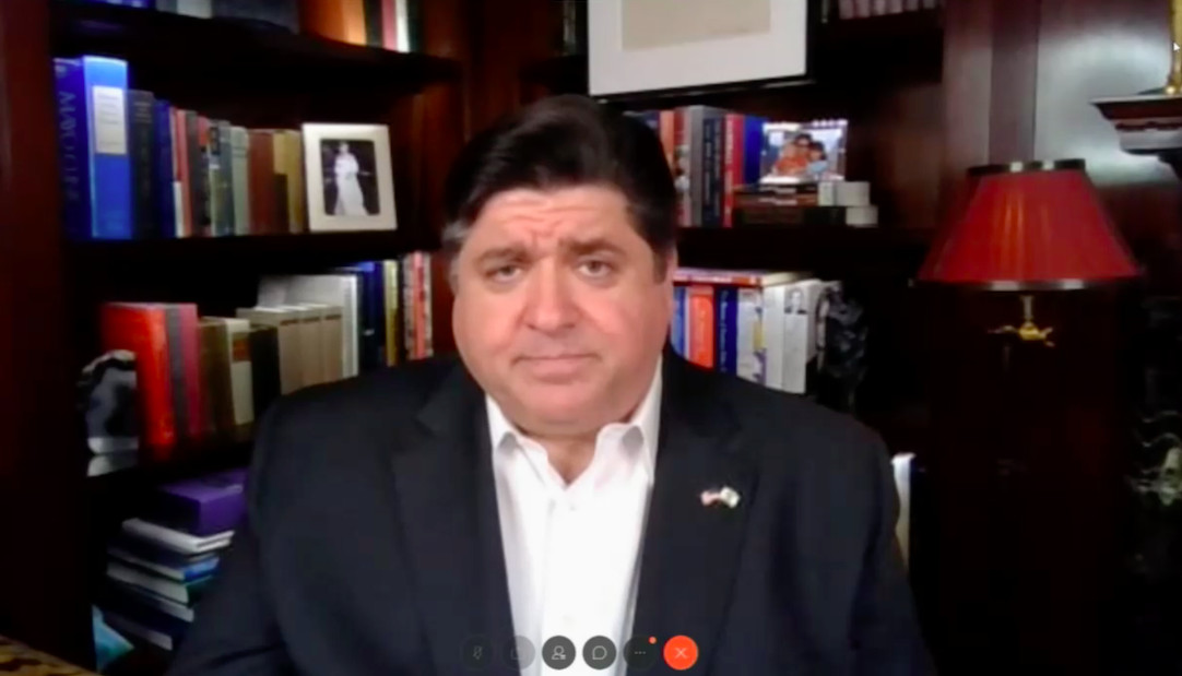 Illinois Gov. J.B. Pritzker speaks during a news briefing from his home in May of 2020 after a member of his senior staff has tested positive for COVID-19.