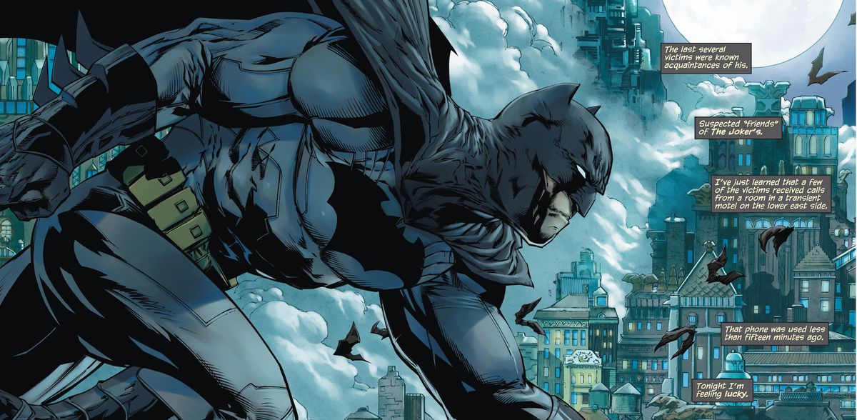 Batman scowls while dashing over city rooftops. His costume has lots of trim lines all over it, with bulky gloves and short ears, in Detective Comics #1, DC Comics (2011). 