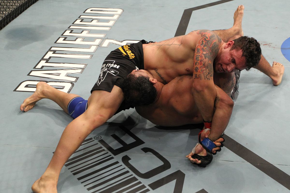 Frank Mir locks in a brutal kimura on Antonio Rodrigo Nogueira at UFC 140 in 2011. 