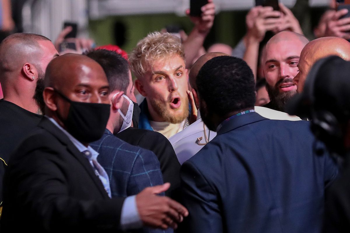 Jake Paul and Daniel Cormier come face to face at UFC 261 for no good reason at UFC 261 in Jacksonville, Florida.