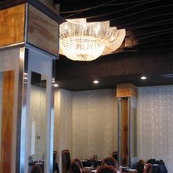 Large chandeliers and hard wood dot the ceiling