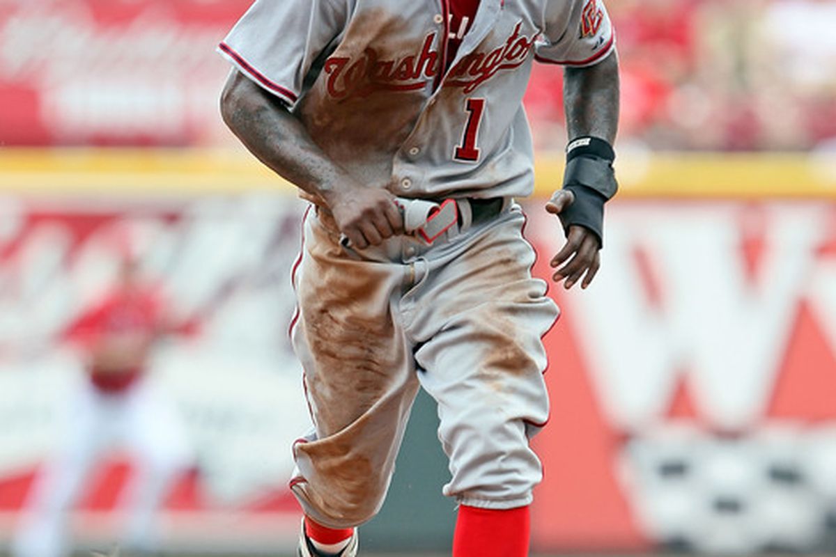 CINCINNATI - JULY 22:  Nyjer Morgan #1 of the Washington Nationals runs to third base during the game against the Cincinnati Reds at Great American Ball Park on July 22 2010 in Cincinnati Ohio.  (Photo by Andy Lyons/Getty Images)