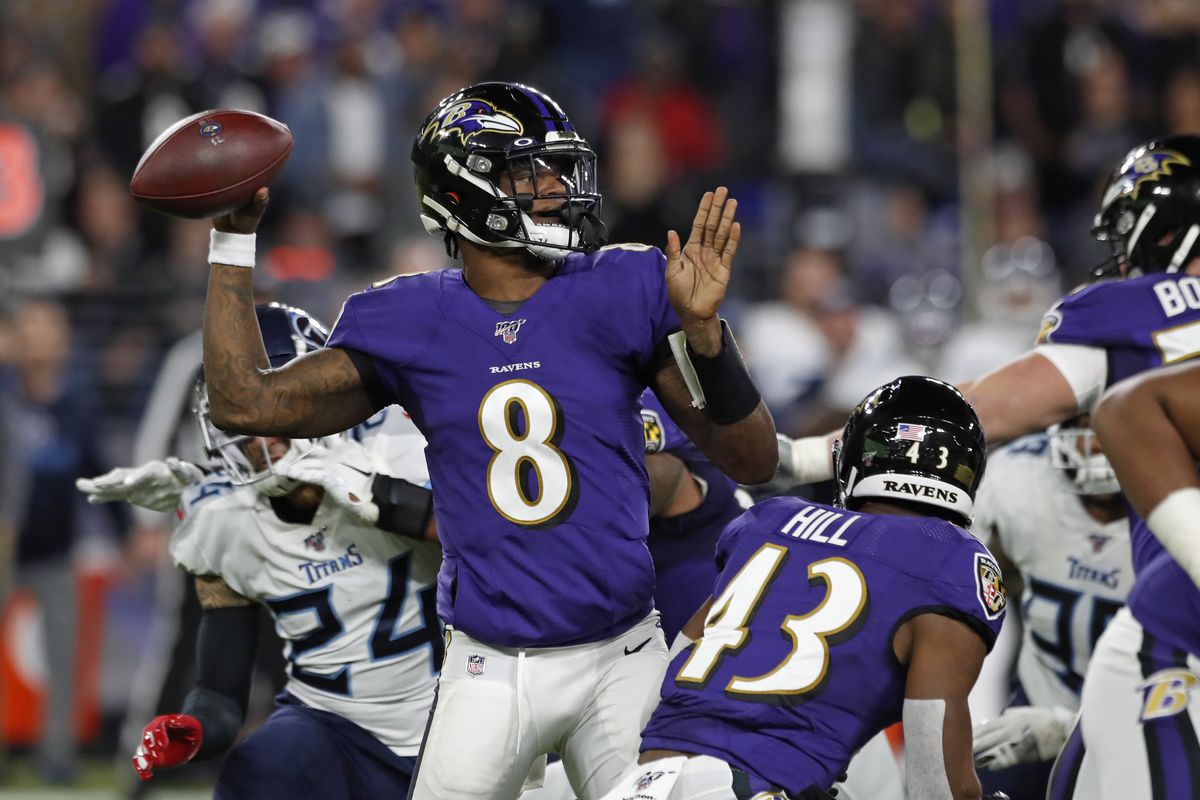 Lamar Jackson #8 of the Baltimore Ravens throws the ball during the second quarter of the AFC Divisional Playoff game against the Tennessee Titans at M&amp;T Bank Stadium on January 11, 2020 in Baltimore, Maryland.
