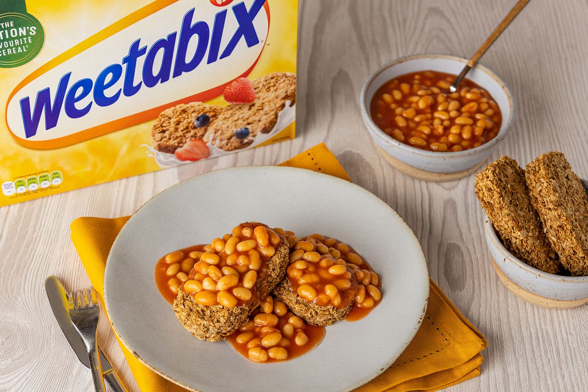 A picture of a plate with Weetabix topped with baked beans