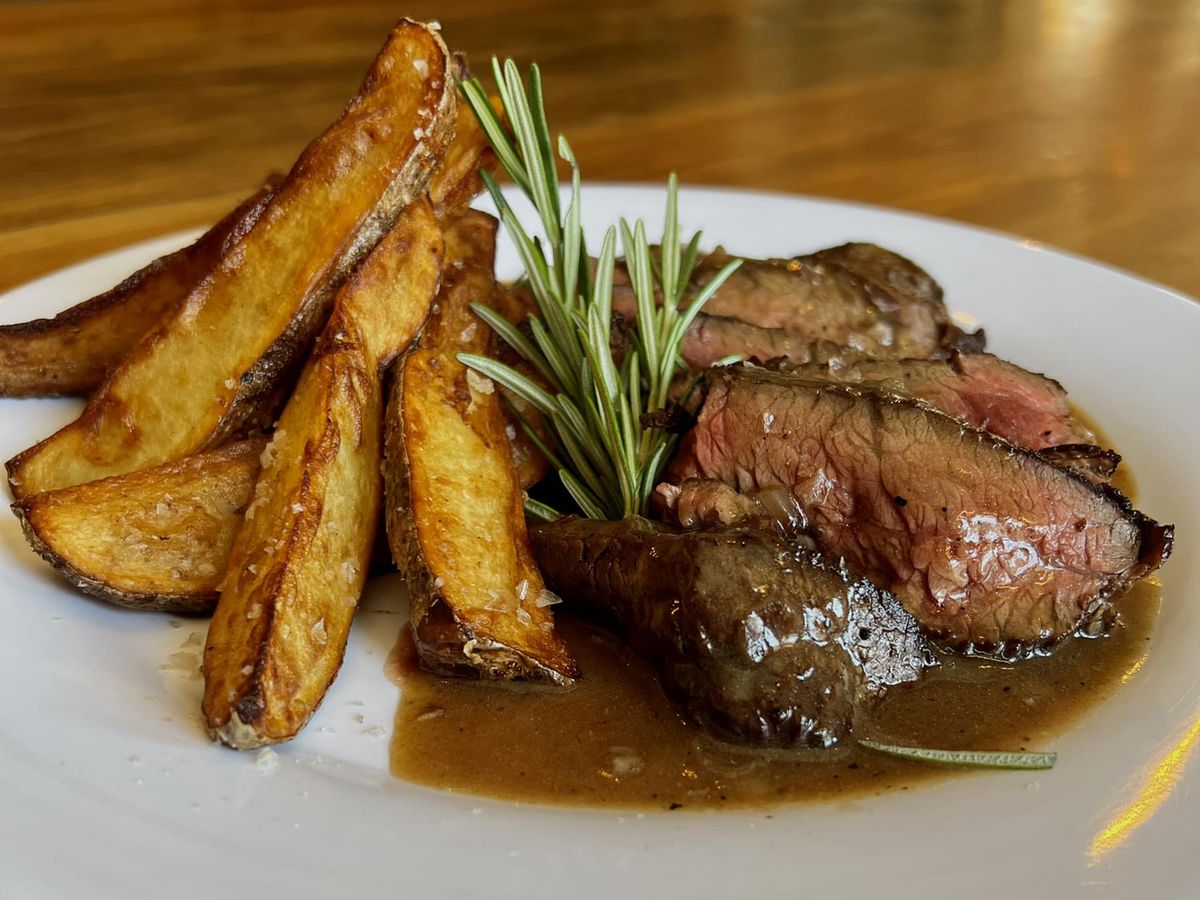 Hanger steaks with bordelaise and steak fries at Cherokee Rose BBQ Bar &amp; Kitchen in Stone Mountain, GA. 