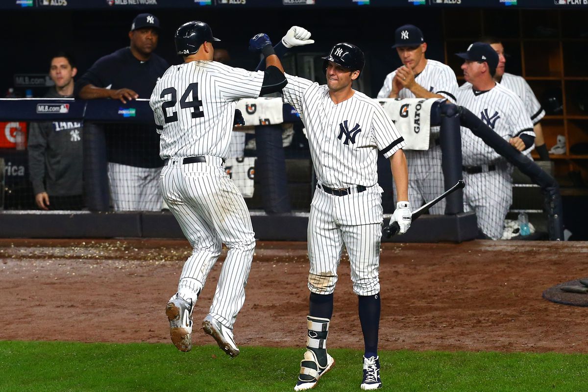 Gary Sanchez celebrates with Greg Bird after hitting a solo home run against Bryan Shaw to give the Yankees a 7-3 lead over the Indians in Game Four of the ALDS at Yankee Stadium.
