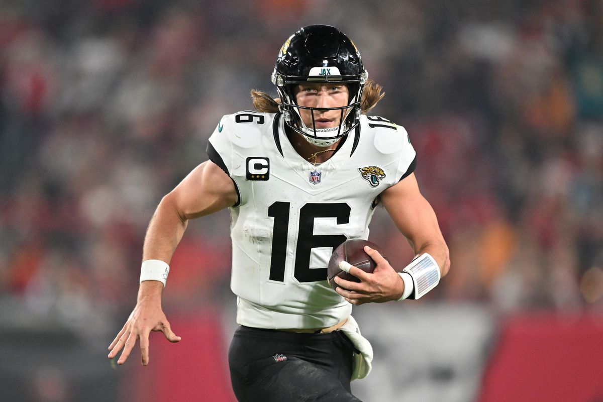 Trevor Lawrence #16 of the Jacksonville Jaguars runs the ball during the third quarter against the Tampa Bay Buccaneers at Raymond James Stadium on December 24, 2023 in Tampa, Florida.