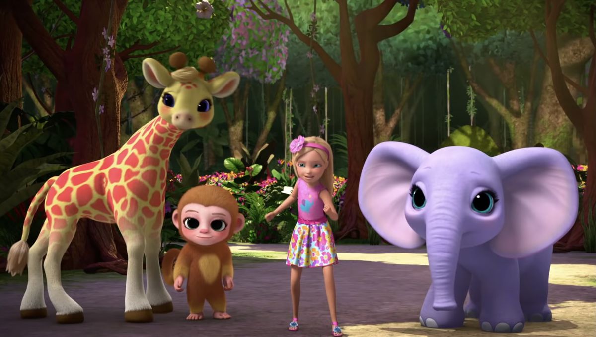 Chelsea, a young blonde girl, standing in a jungle with a big-eyed giraffe, monkey, and elephant.