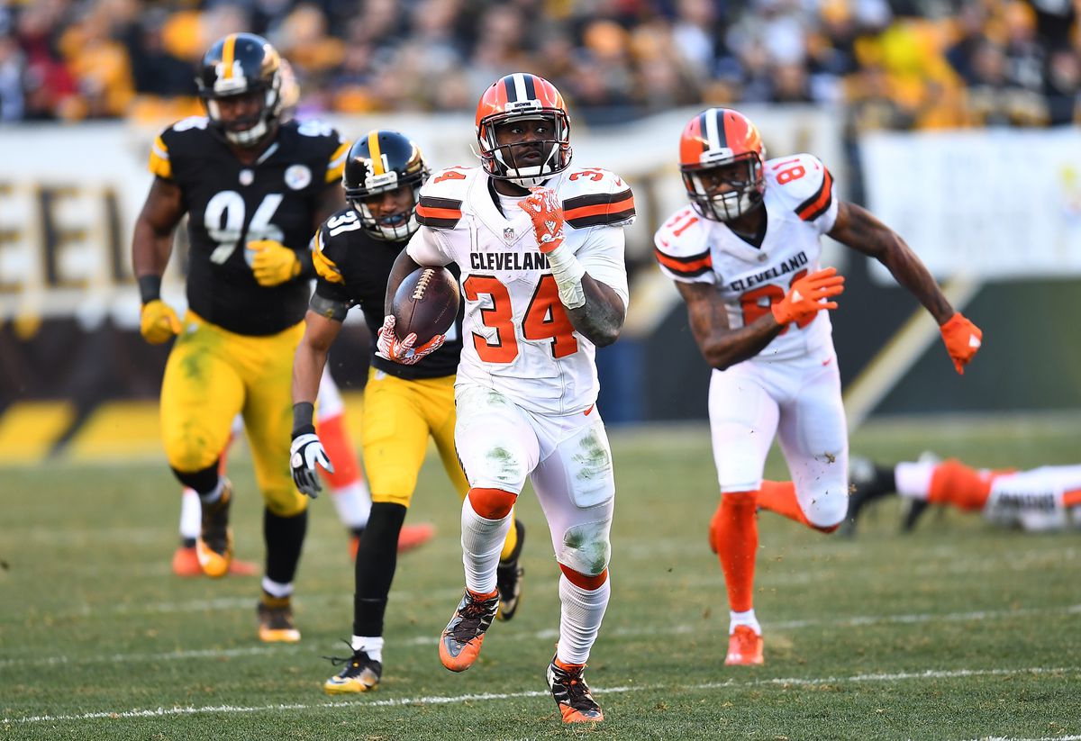 Isaiah Crowell of the Cleveland Browns rushes against the Pittsburgh Steelers in the fourth quarter during the game at Heinz Field on January 1, 2017 in Pittsburgh, Pennsylvania.