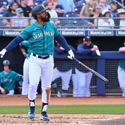 Seattle Mariners right fielder Teoscar Hernandez (35) hits a 3 run home run in the second inning of a spring training game against the Cleveland Guardians at the Peoria Sports Complex.