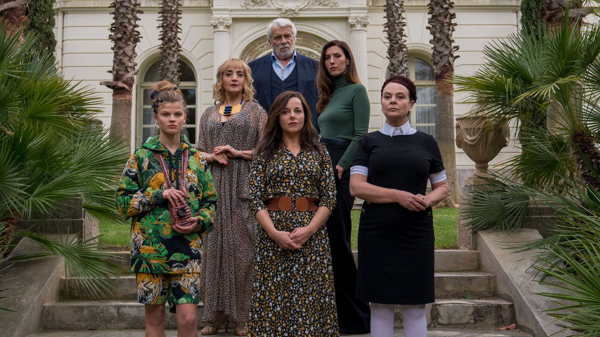 (L-R, Top to Bottom) Laure Calamy, center, with, clockwise from left, Céleste Brunnquell, Dominique Blanc, Jacques Weber, Doria Tillier and Véronique Ruggia Saura in “The Origin of Evil.”Credit... Laurent Champoussin/IFC Films