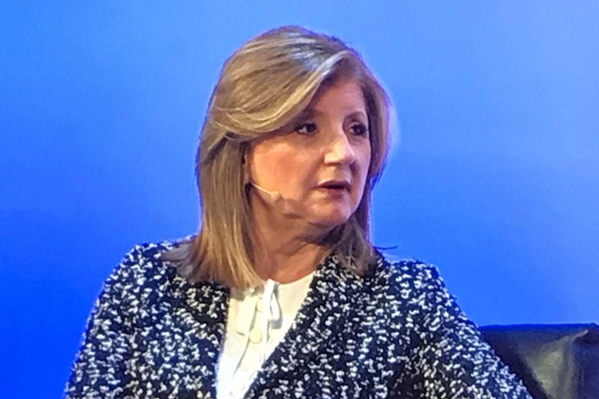 A photo of Arianna Huffington at the Qualtrics X4 event.