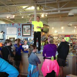 Wasatch Running Center owner Glen Gerner addresses the runners who turned out Monday night to raise money for and remember the victims of the Boston Marathon bombings. The fun run was part of a nationwide effort by independent running store owners to support each other, runners and those injured in the attacks.