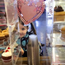 Gretchen Wilde, 5, chooses cupcakes at Mini's Gourmet Cupcakes in Salt Lake City on Friday, Feb. 6, 2015. The cupcake chop owner, Leslie Fiet, rescued a kidnapped 3-year-old girl on Wednesday evening, and the shop has seen an increase in customers and community support.