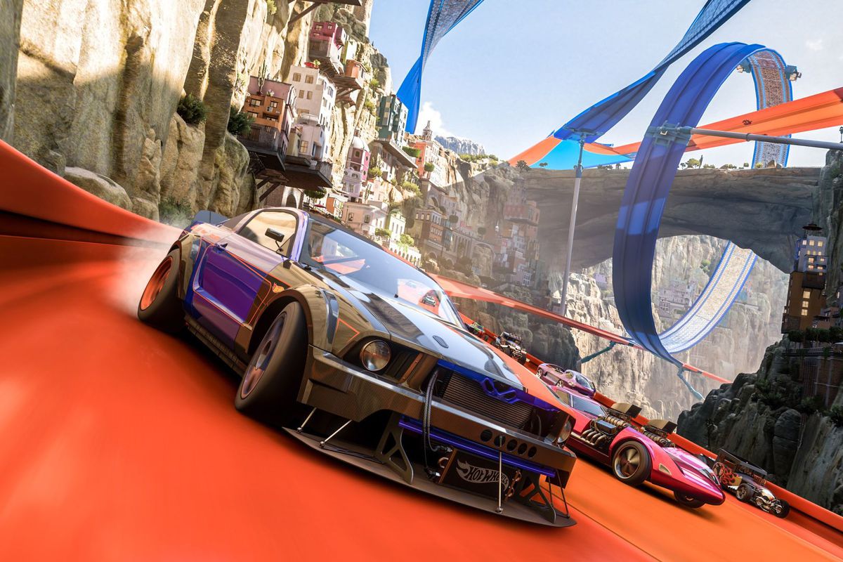 Hot Wheels cars race through blue and orange tracks in Forza Horizon 5’s Mexico