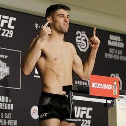 Vicente Luque poses after making weight at UFC 229 weigh-ins.