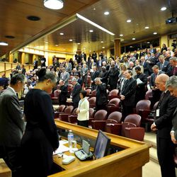 The audience prays at the Colloquium on the Complementarity of Man and Woman, Tuesday, Nov. 18, 2014, in Vatican City.