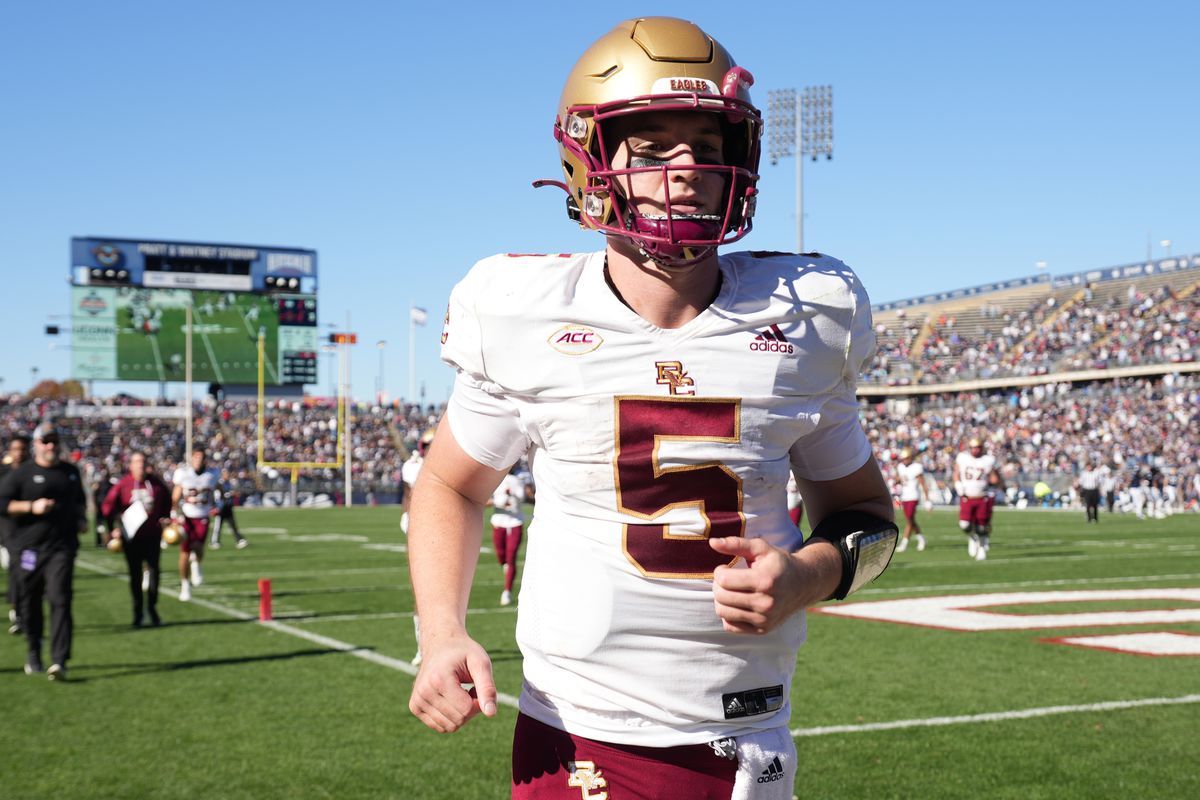 Boston College Eagles quarterback Phil Jurkovec exits the field at the end of the first half against the Connecticut Huskies at Rentschler Field at Pratt &amp; Whitney Stadium.