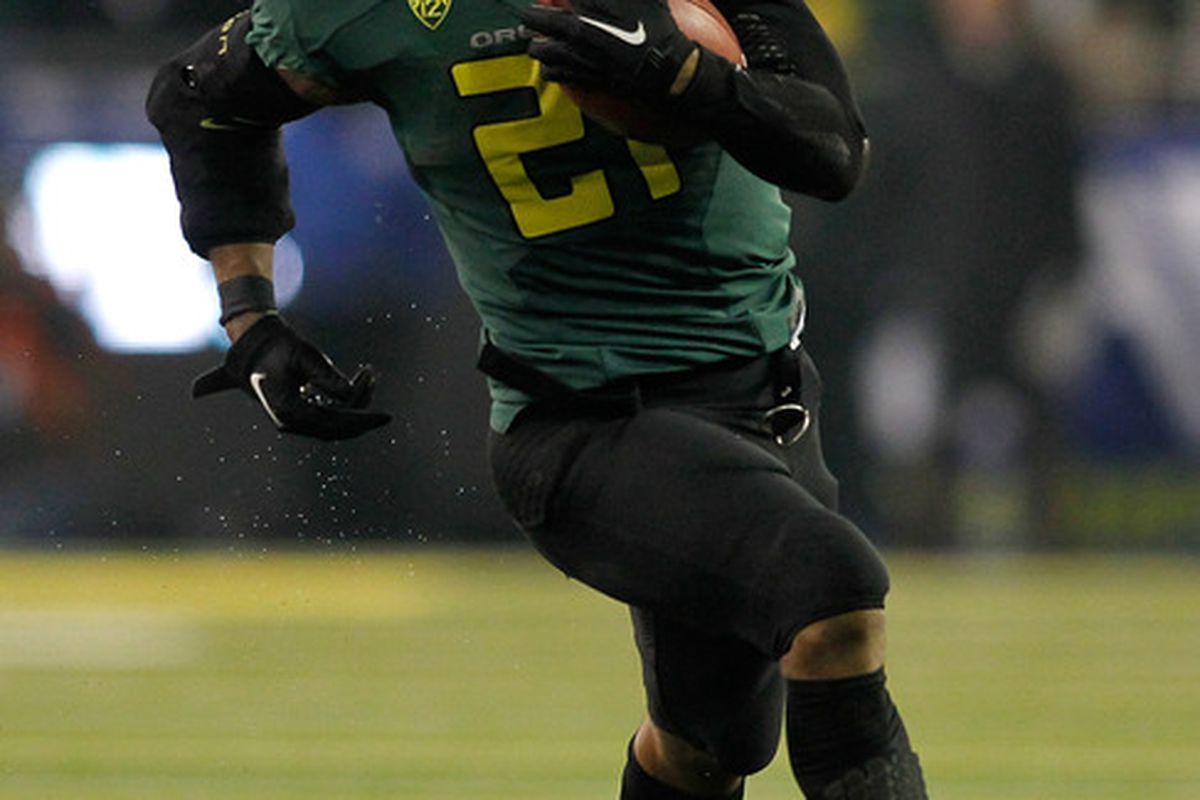 EUGENE, OR - DECEMBER 02:  LaMichael James #21 of the Oregon Ducks runs against the UCLA Bruins  during the Pac 12 Championship Game on December 2, 2011 at the Autzen Stadium in Eugene, Oregon.  (Photo by Jonathan Ferrey/Getty Images)