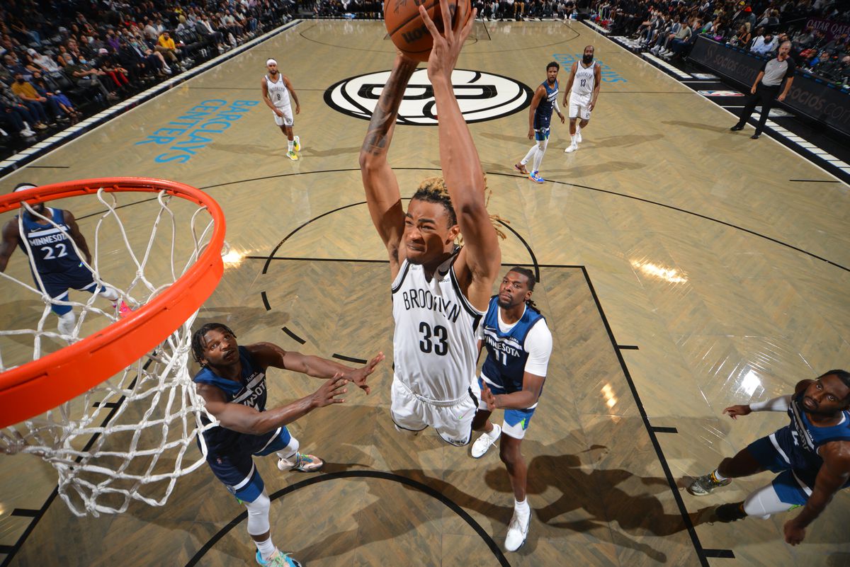 Nicolas Claxton #33 of the Brooklyn Nets dunks the ball against the Minnesota Timberwolves during a preseason game on October 14, 2021.