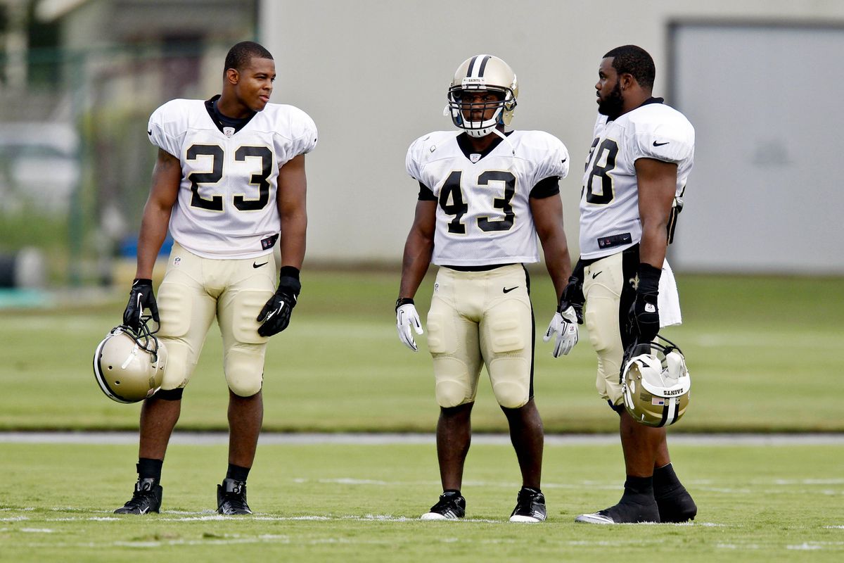 July 28, 2012; Metairie, LA, USA; New Orleans Saints running backs Pierre Thomas (23), and Darren Sproles (43) and Mark Ingram (28) during a training camp practice at the team's practice facility. Mandatory Credit: Derick E. Hingle-US PRESSWIRE