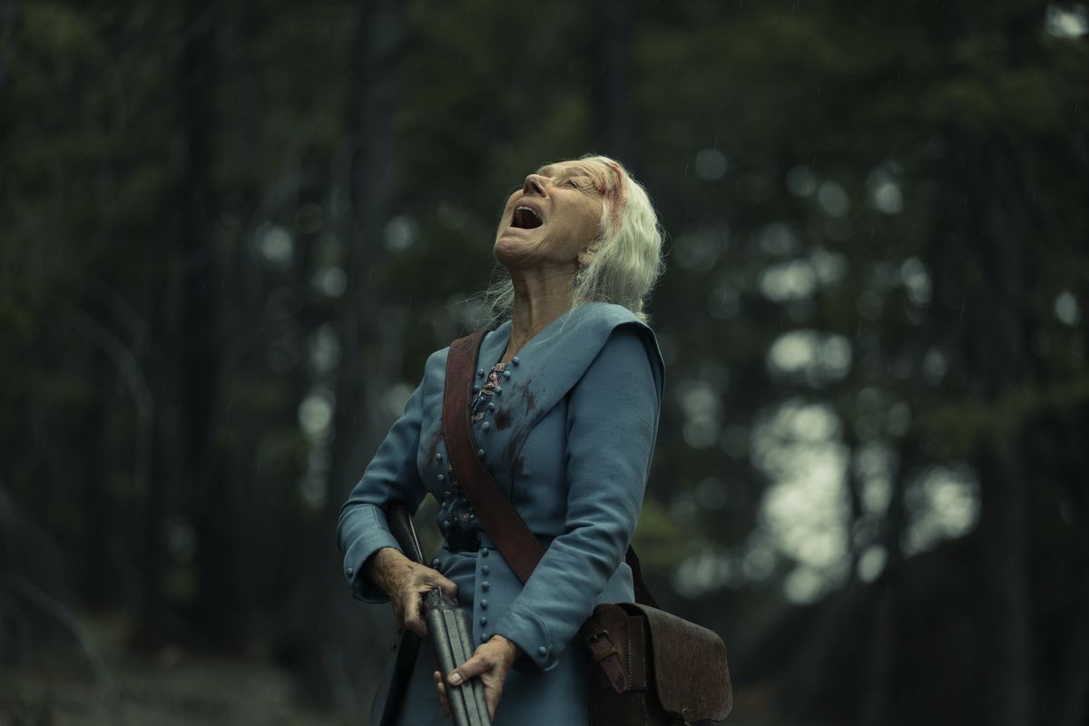 Cara Dutton, holding down a shotgun, howls in pain in the air in the 1923 Yellowstone prequel.