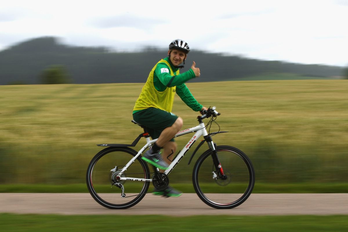 Marko Marin rides his bike to training...