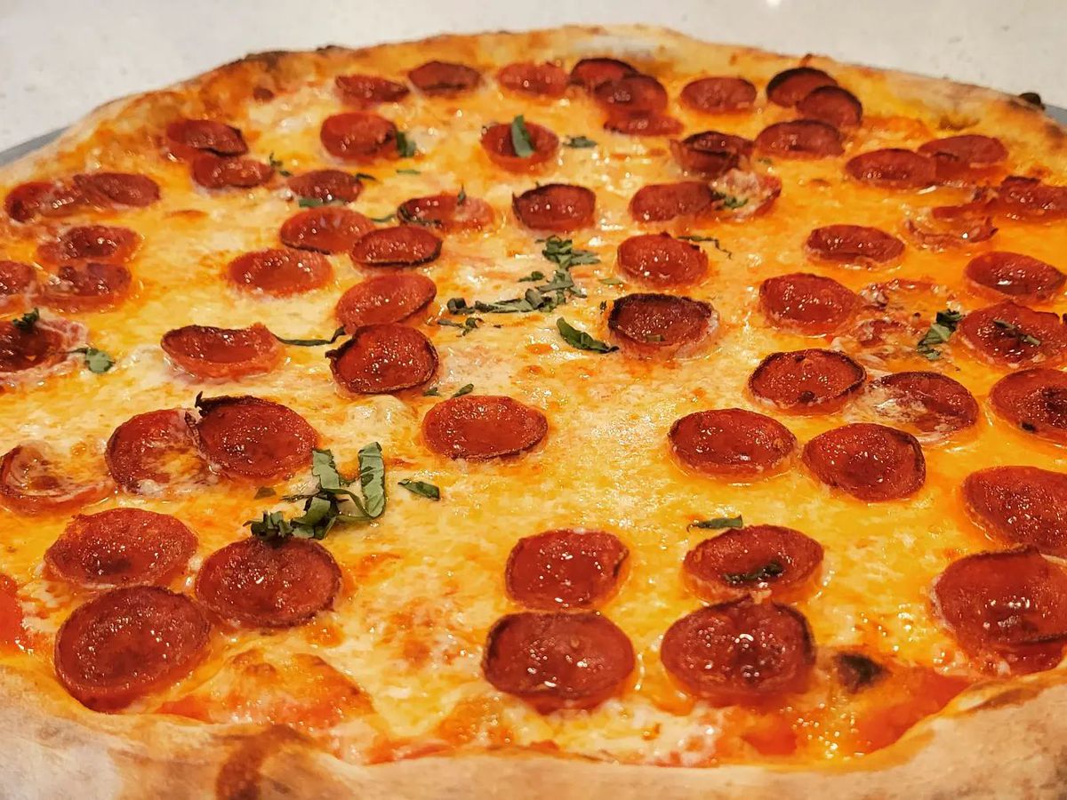 A huge round pepperoni pizza from E Ke Pizza from the team behind Baraonda&nbsp;in Vinings Atlanta.