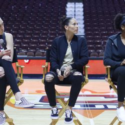 The Seattle Storm’s Breanna Stewart and Sue Bird along with the Connecticut Sun’s Morgan Tuck listen to a question from moderator Sarah Kustok.