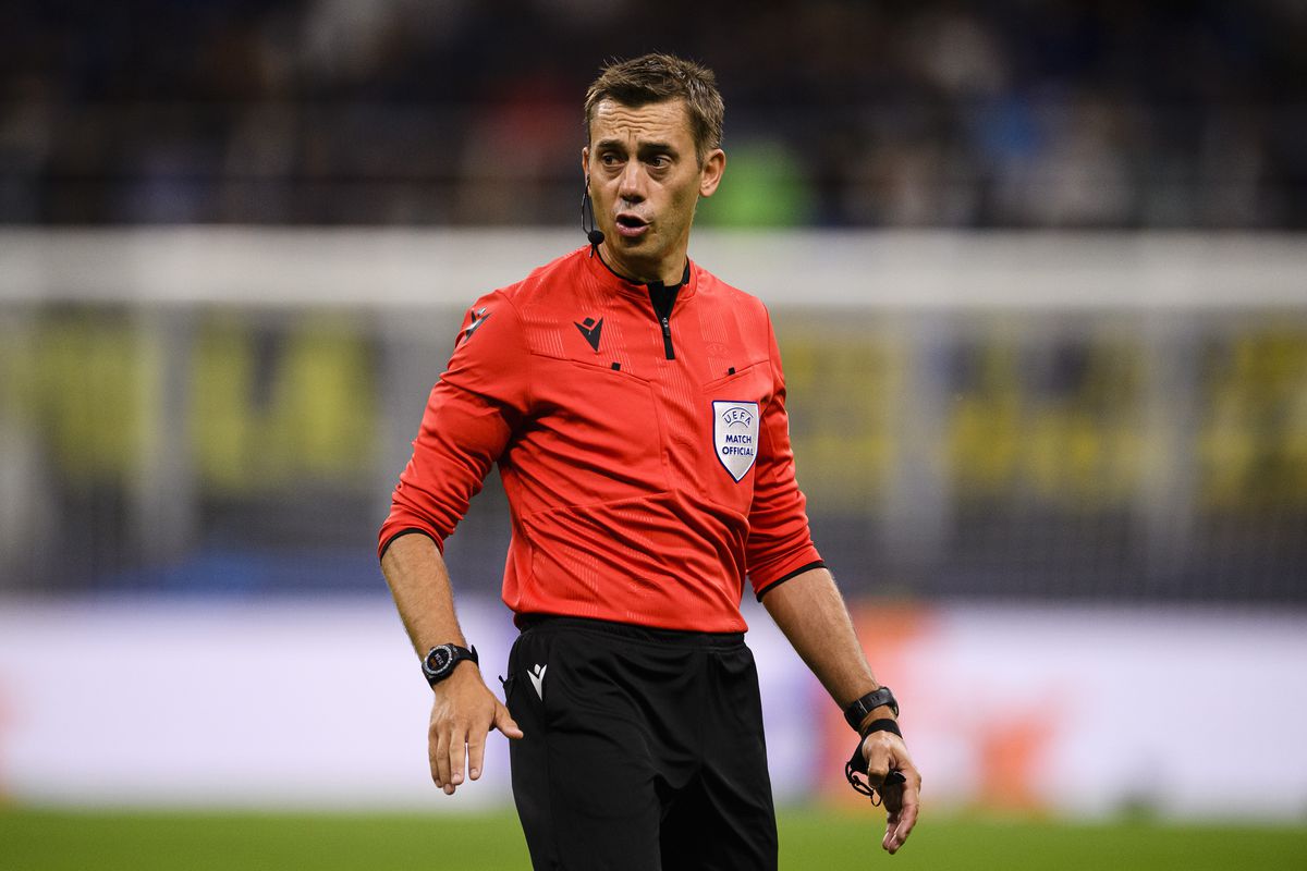 Referee Clément Turpin walks in the field during the UEFA Champions League group C match between FC Internazionale and FC Bayern München at San Siro Stadium on September 7, 2022 in Milan, Italy.
