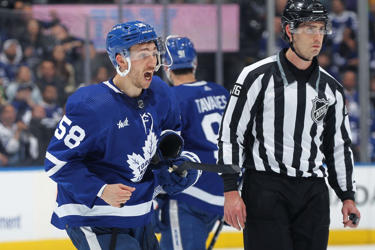 Michael Bunting #58 of the Toronto Maple Leafs reacts to being ejected from the game against the Tampa Bay Lightning during Game One of the First Round of the 2023 Stanley Cup Playoffs at Scotiabank Arena on April 18, 2023 in Toronto, Ontario, Canada.  &nbsp;  