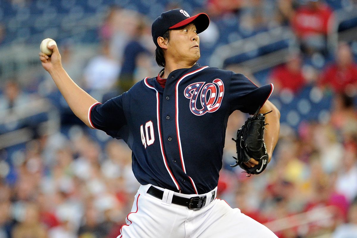 WASHINGTON, DC - AUGUST 16:  Chien-Ming Wang #40 of the Washington Nationals pitches against the Cincinnati Reds at Nationals Park on August 16, 2011 in Washington, DC.  (Photo by Greg Fiume/Getty Images)