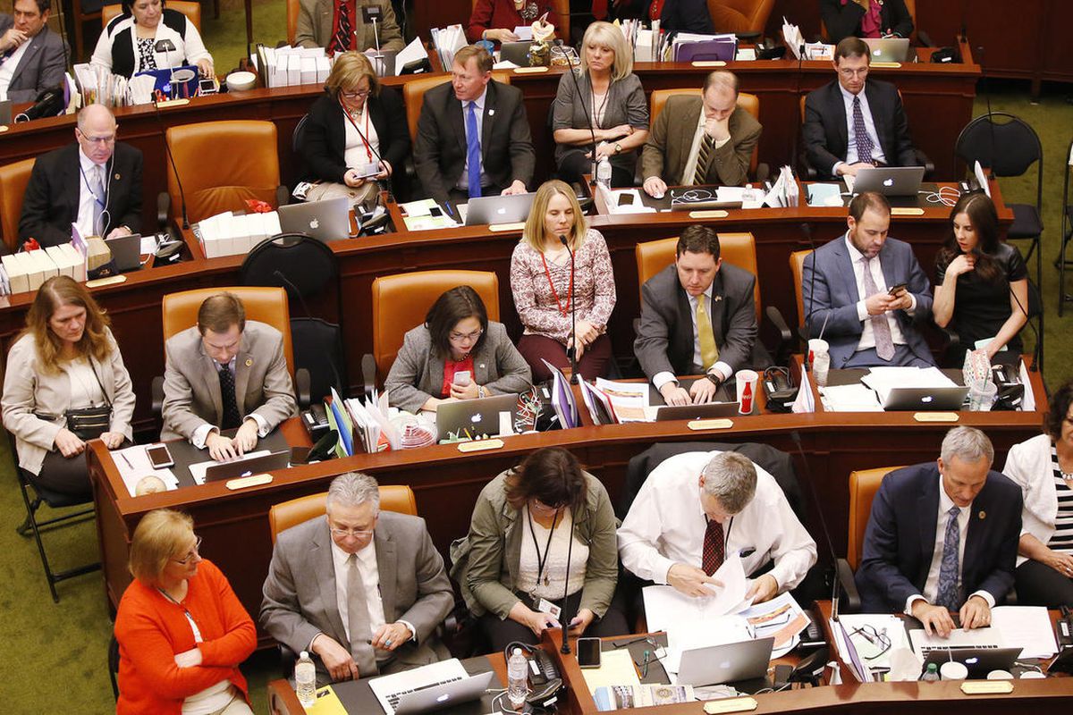 Representatives listen during the closing night of the legislature in Salt Lake City Thursday, March 10, 2016.