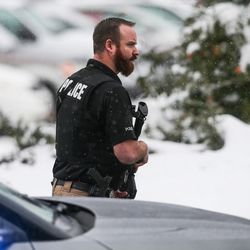 Law enforcement officers respond to a shooting at Mueller Park Junior High School in Bountiful on Thursday, Dec. 1, 2016.