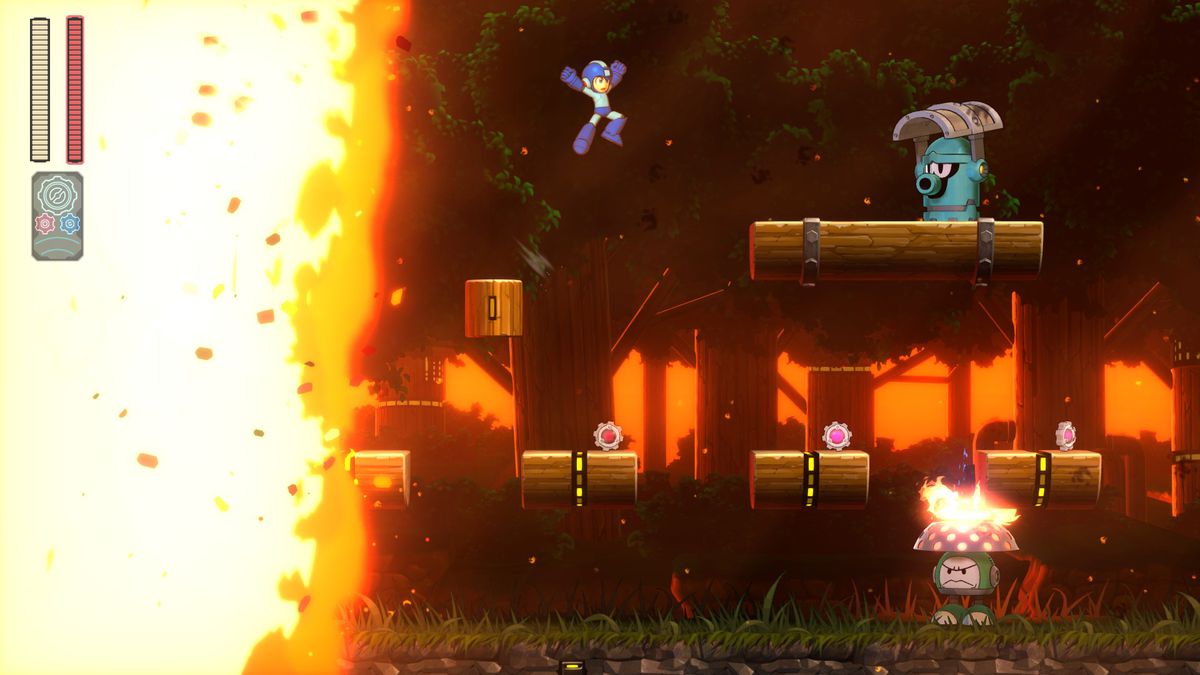 Mega Man 11 - Mega Man runs from a wall of flame in Torch Man’s stage