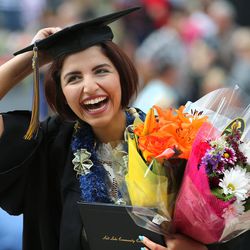 Shiva Sanavi celebrates after receiving her degree from Salt Lake Community College at the Maverik Center in West Valley City on Friday, May 6, 2016.