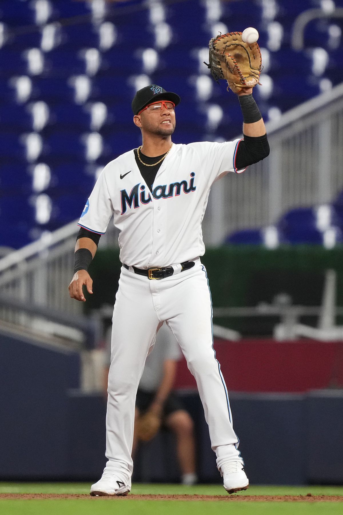 Yuli Gurriel #10 of the Miami Marlins fields the ball before a put out in the game against the San Francisco Giants at LoanDepot Park on April 17, 2023 in Miami, Florida.