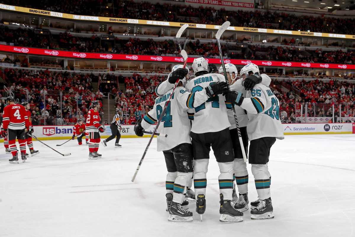 The San Jose Sharks celebrate after scoring against the Chicago Blackhawks in the third period at United Center on April 14, 2022 in Chicago, Illinois.