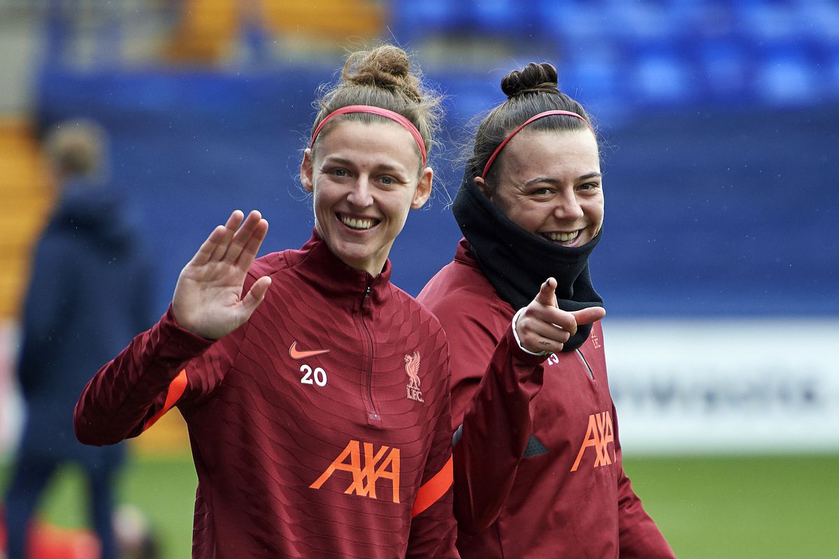 Yana Daniels and Meikayla Moore of Liverpool during the warm-up at Prenton Park on February 13, 2022 in Birkenhead, England.