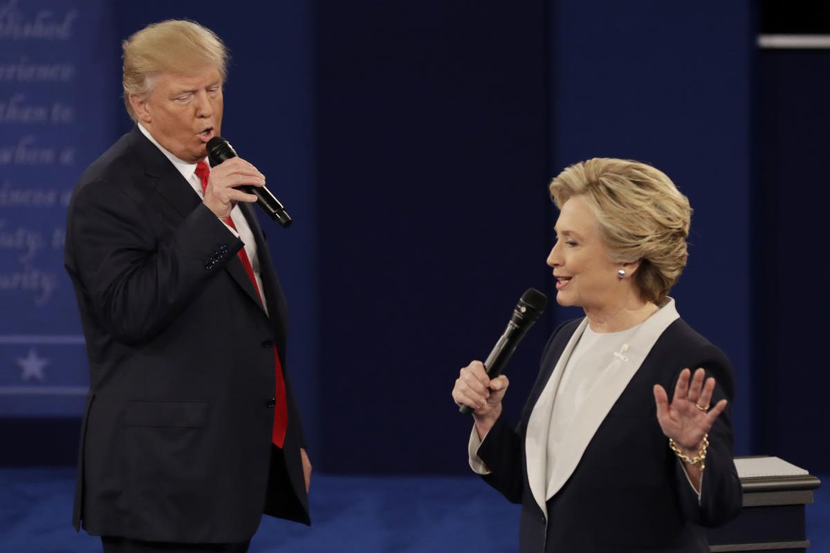 FILE - In this Sunday, Oct. 9, 2016, file photo, Republican presidential nominee Donald Trump and Democratic presidential nominee Hillary Clinton speak during the second presidential debate at Washington University in St. Louis. The contentiousness of the