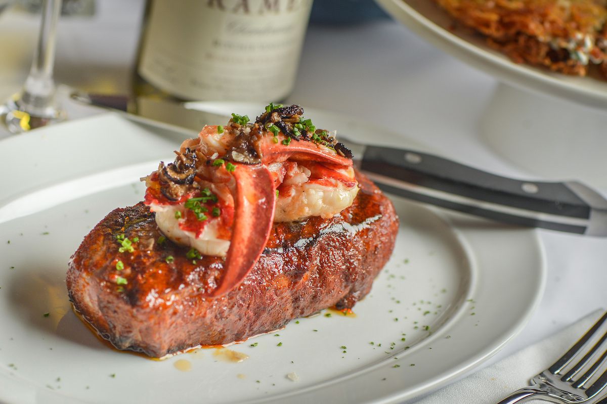 Steak 48’s steak topped with truffle sautéed Maine lobster.